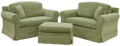 Two Hughes sleeper chairs and ottoman